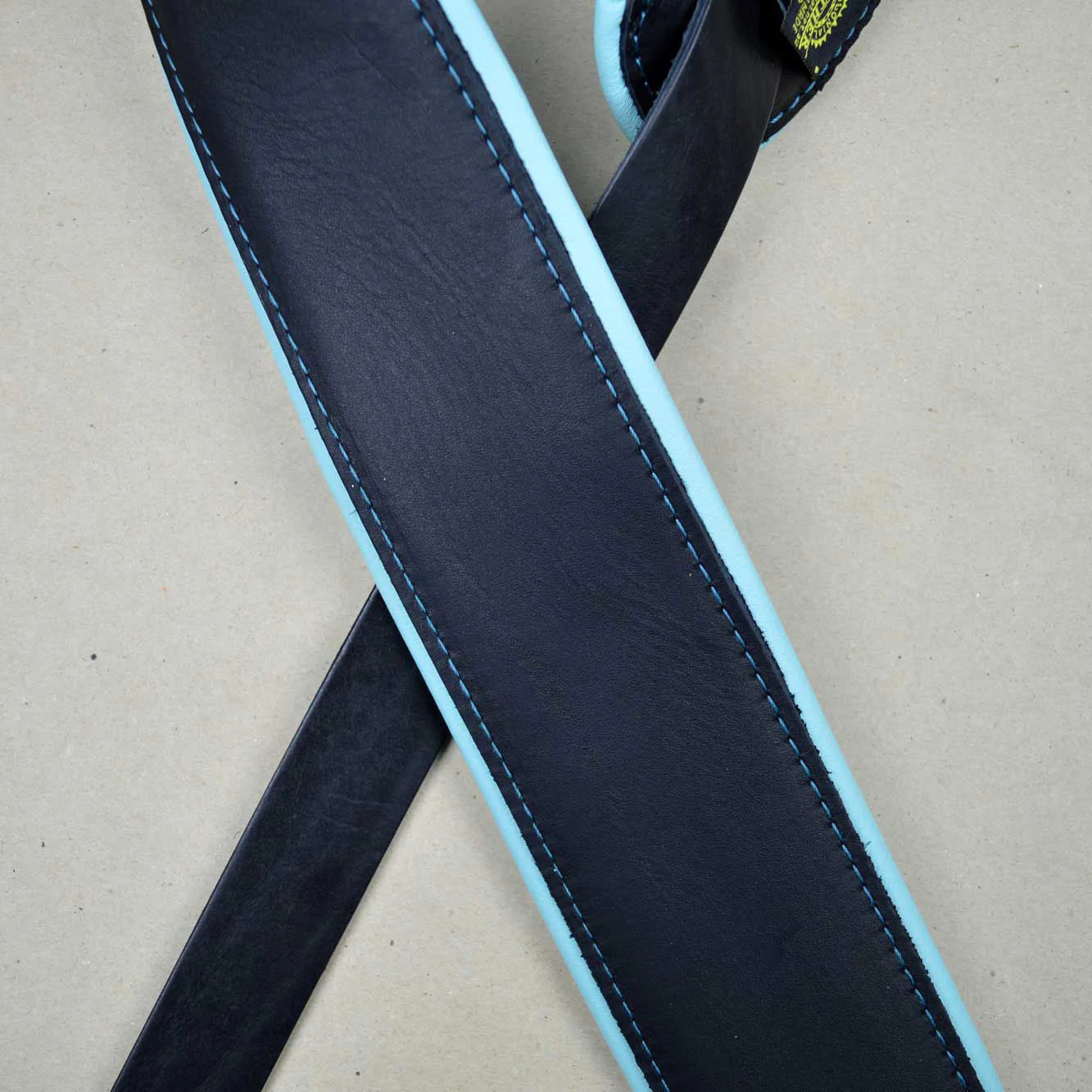 Colonial Leather 2.5inch Padded Upholstery Leather Guitar Strap - Black & Aqua - Image 2